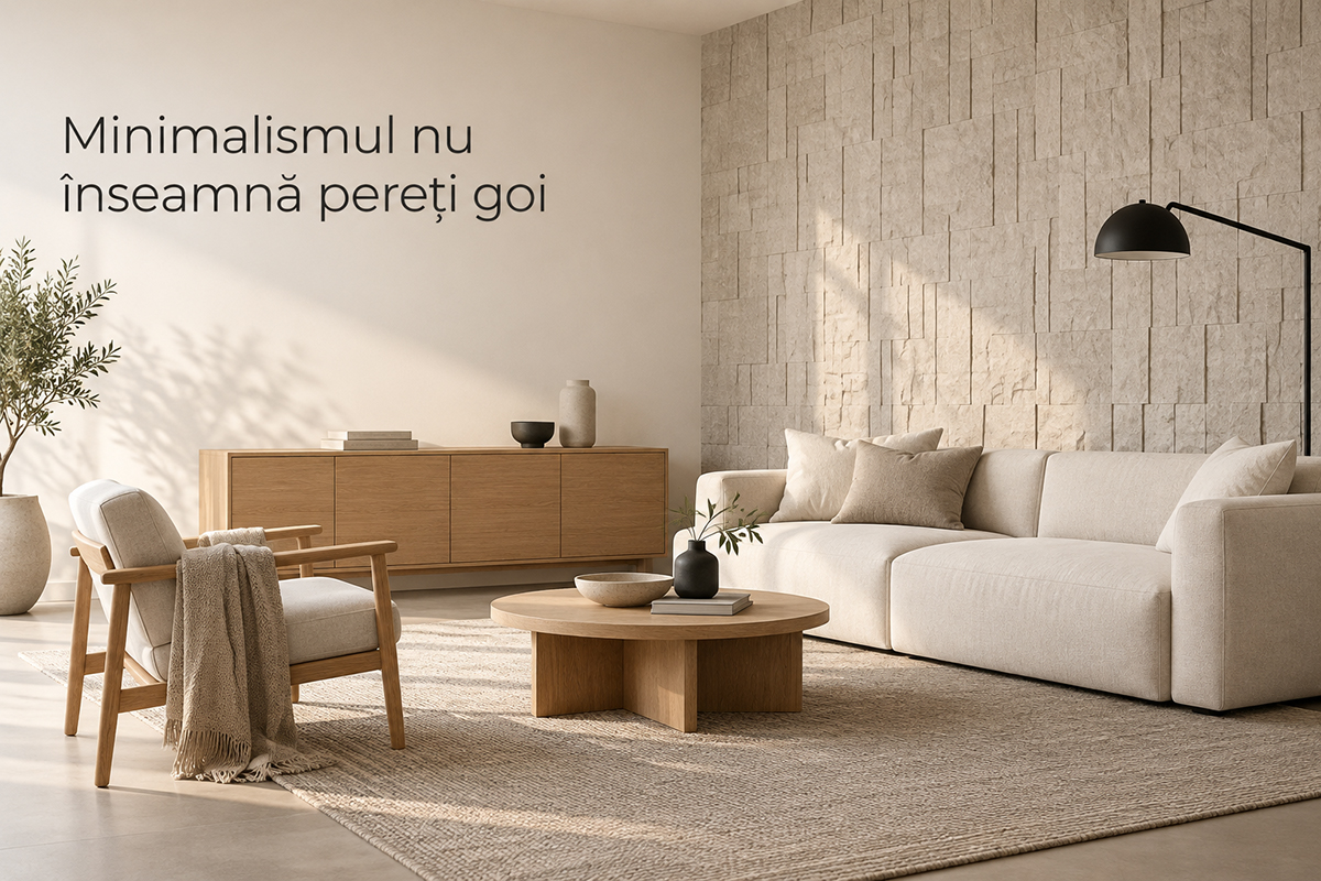 Living minimalist cald cu perete accent din piatră decorativă în tonuri neutre